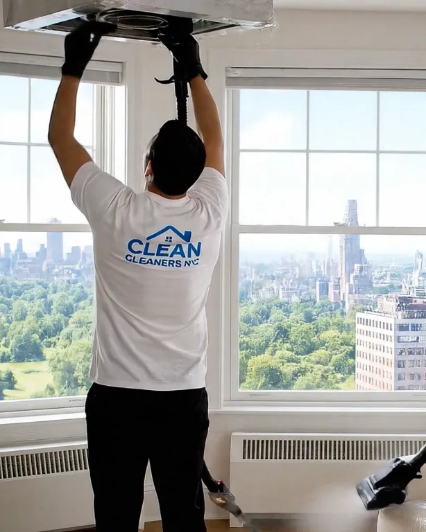 A Clean Cleaners NYC professional providing detailed cleaning in a Manhattan apartment, showcasing trusted cleaning services across New York City.